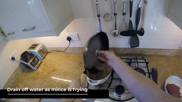 drain off water as mince is frying
